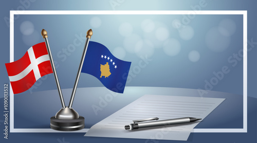 Denmark and Kosovo National flags on small table with bokeh background, cooperative relationship