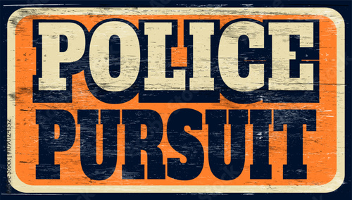 Aged vintage police pursuit sign on wood
