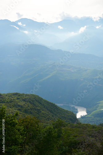 Colombian Andean landscape, mountains covered with lush, green vegetation. View from a lookout point in Guane, Santander.