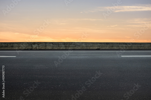 Side view of asphalt road with landscape of sunset sky. road background.