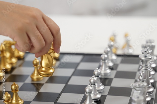 Businessman play with chess game. success management concept of business strategy and tactic challenge
