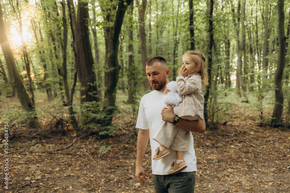 Happy family, Father walks with his daughter on his shoulders in summer park. Dad plays with his beloved daughter, dad, child walk in woods. Child and parent. Family weekend outdoors. Kid, dad walk Happy family, Father walks with his daughter on his shoulders in summer park. Dad plays with his beloved daughter, dad, child walk in woods. Child and parent. Family weekend outdoors. Kid, dad walk