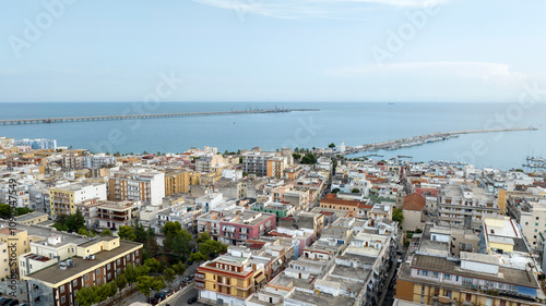 Tableau sur toile Aerial view of houses, buildings, apartments and roof of Manfredonia, in the province of Foggia, in Puglia, Italy