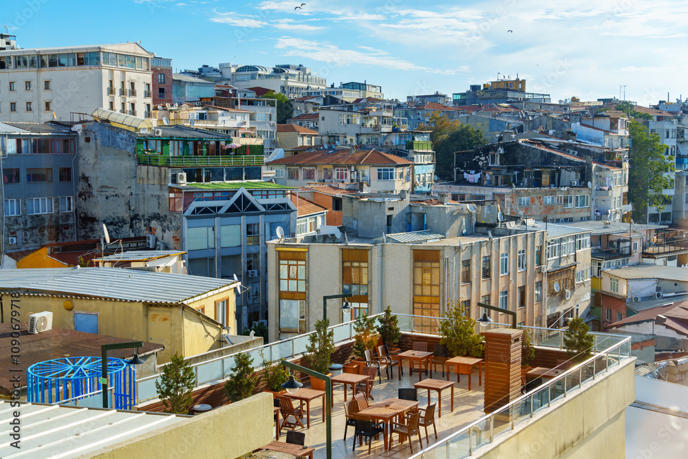 Fototapeta premium Rooftop cafe in Istanbul, Turkey, view of the city architecture