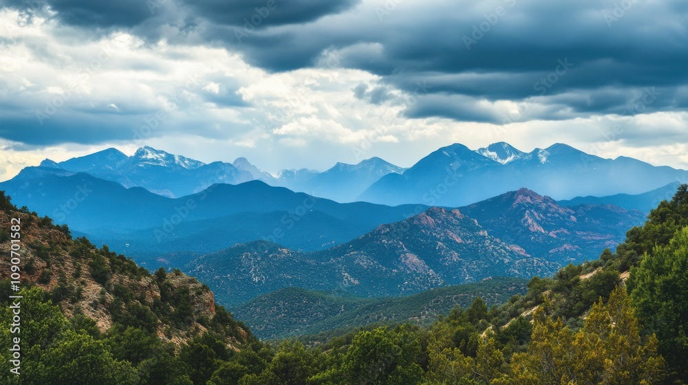 Fototapeta premium Rocky mountain range under a cloudy sky, rugged terrain, natural beauty, atmospheric light, adventure and exploration, untouched landscape, majestic view.