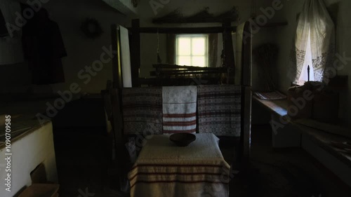 Interior of a Ukrainian Village House with Traditional Embroidered Towels on Windows