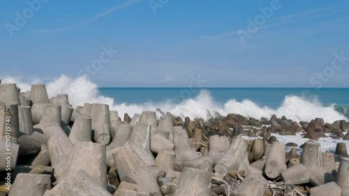 Slow motion Camera movement on the beach with a tripod to hold back the waves