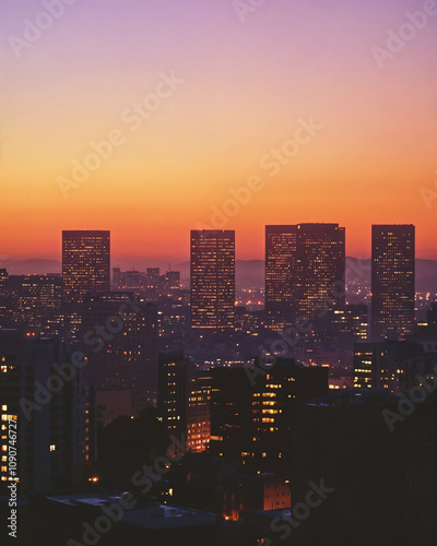 Modern Skyscrapers at Twilight - Sleek Architecture and Reflective Urban Views photo