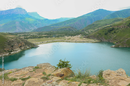 Majestic Elbrus with Turquoise Lake Syltrankel in the Foreground