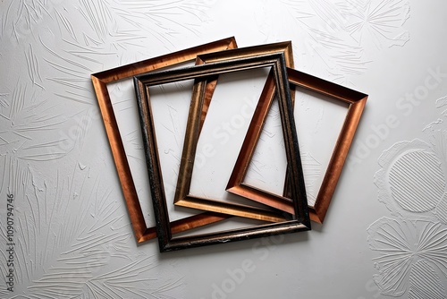 Scorched Paper Frames Lying on a Stark White Background with Textured Designs