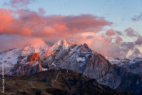 Panoramic view of snow-capped mountains in the Dolomites in Italy. photo