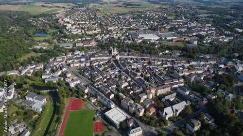 Aerial around the old town of the city of Oelsnitz, Germany on a sunny day in autumn	 photo