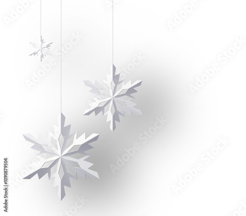 Snowflakes are hanging on strings, made from white paper, casting soft shadows on a white background. Minimalistic winter holiday concept