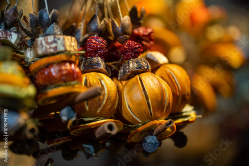 Budapest, Hungary - November 15, 2024: Colorful and aromatic dried fruit decor. Vorosmarty square Christmas market. Macro shot.