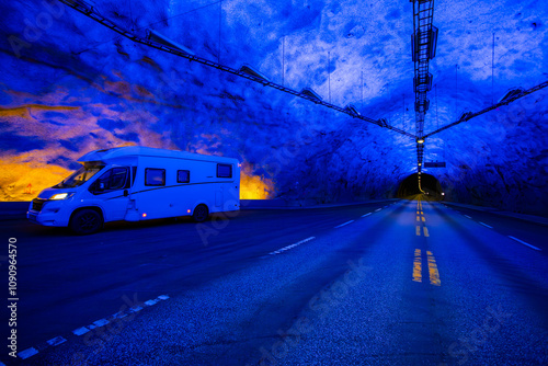 Motorhome inside the Lærdal Tunnel, the longest tunnel in the world, in South Norway, with vibrant blue lighting. photo