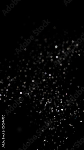 Shiny silver glitter on black background for elegant and glamorous design projects, black