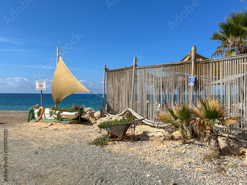 A public, rocky beach on the Mediterranean coast in the Kissonergia region of Cyprus photo