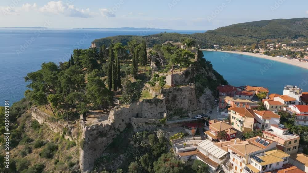 Aerial drone view of the old fortress in the coastal town of Parga, Greece. Aerial drone view of the old fortress in the coastal town of Parga, Greece.