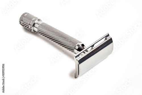 Safety Bar DE Double-Edge Razor with closed comb machined with CNC from marine grade billet stainless steel isolated on white focus stacking shot. Classic Wet Shaving Supplies and Accessories. photo