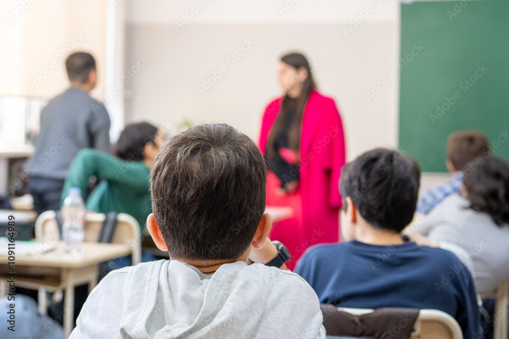 Fototapeta premium School children are participating actively in class