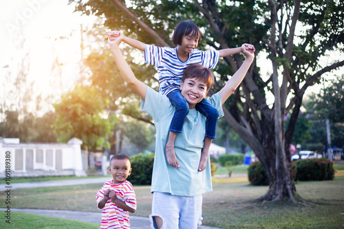 Happy family enjoying in the nature.