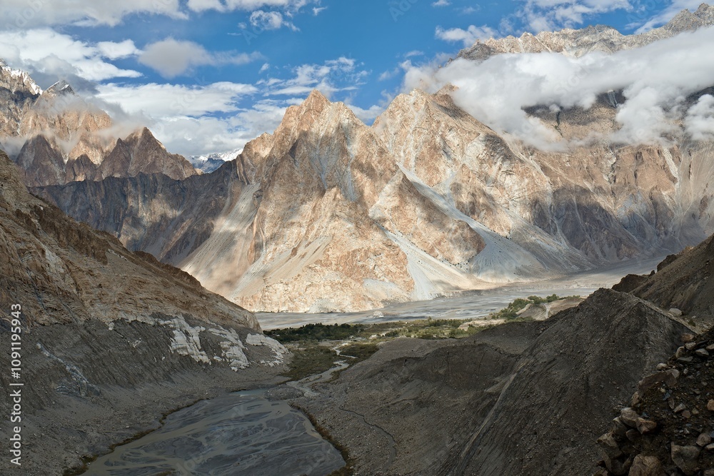 Obraz premium View of Hunza river valley and mountain ranges above Passu village. Karakoram mountain range. Gilgit-Baltistan region. Pakistan. Asia.