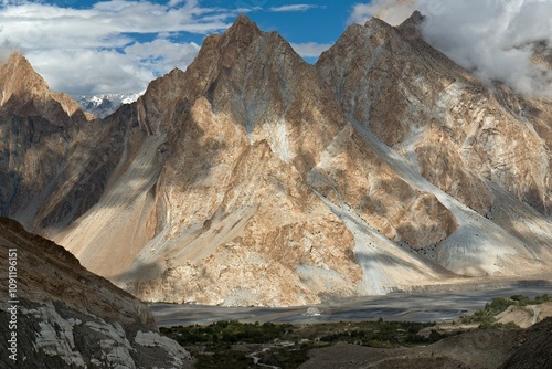 View of Hunza river valley and mountain ranges above Passu village. Karakoram mountain range. Gilgit-Baltistan region. Pakistan. Asia. photo