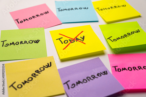 Colored card, with the word Today, crossed out, and next to it cards with the word Tomorrow. Procrastination and postponement.
