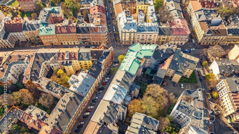 Fototapeta premium Drone photo of urban architecture and old residential complexes in Krakow, Poland. Panoramic view.