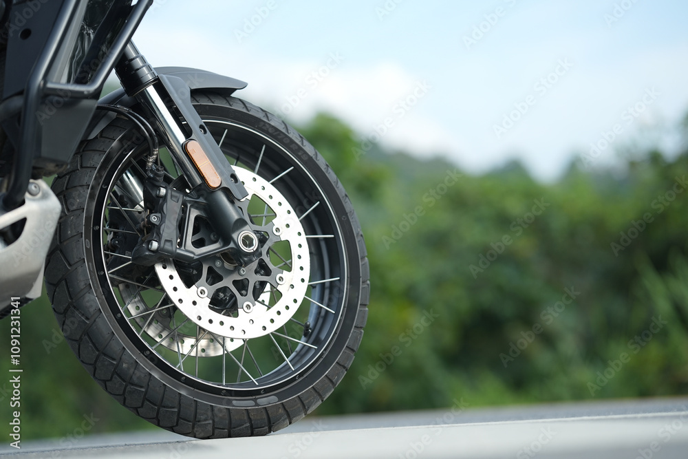 Obraz premium Motorcycle in a sunny motorbike on the road riding.with sunset light. copyspace for your individual text. classic motorcycle..