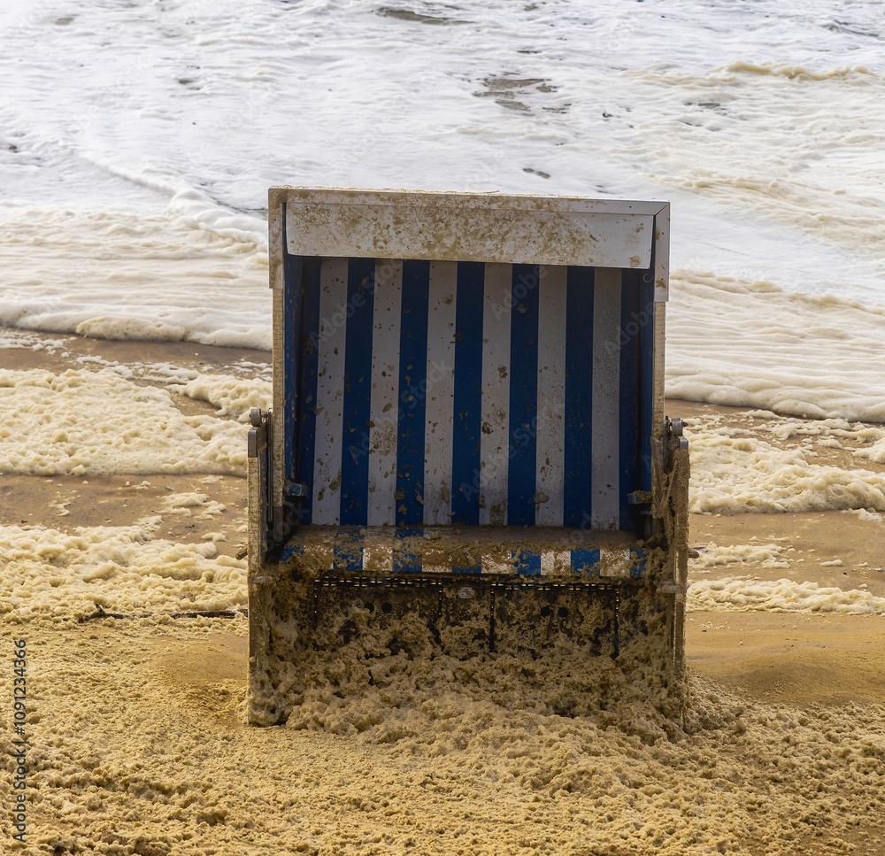 Beach chairs washed away by storm surges on the beach on the island of Sylt