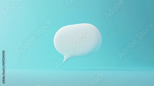 A simplistic white speech bubble gracefully suspended against a calming soft blue background, embodying themes of communication and dialogue.