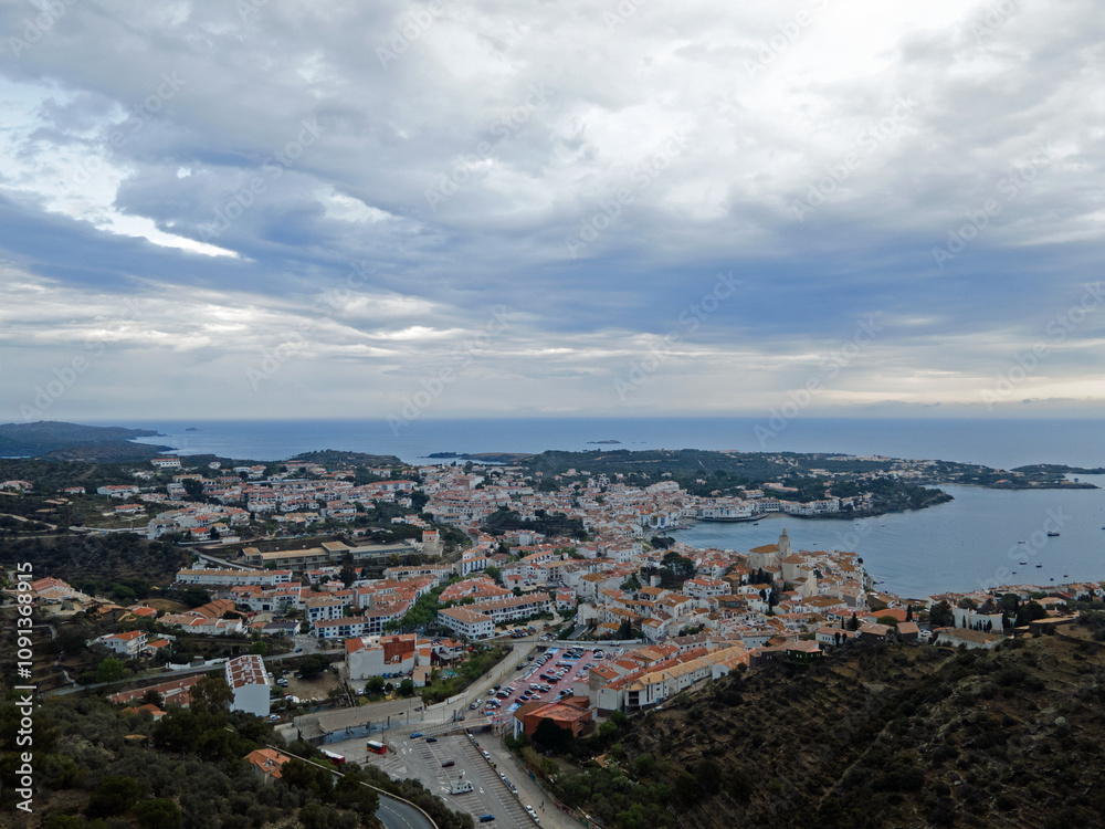 Obraz premium Aerial night city landscape of village and sea of Cadaques during summer Costa Brava
