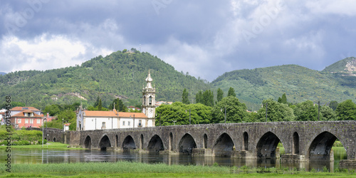 Saint Anthony of the Old Tower Church and the Roman and Medieval bridge, Ponte de Lima, Minho, Portugal photo