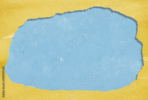 Applique creative collage background from paper pieces. Yellow paper frame border made from torn piece of paper. Creative collage background.