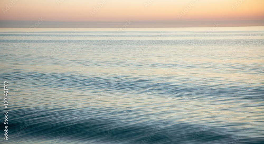Obraz premium Tranquil sunset over gentle ocean waves scenic background for print and design