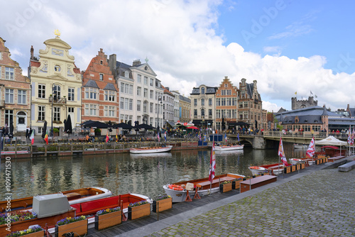 Tourist boats moored along the Graslei, Ghent, Flanders, Belgium