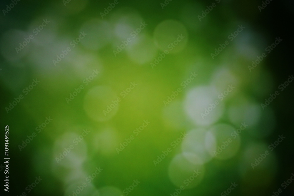 Obraz premium Christmas lights in bokeh. Outside in December. Snow and green bokeh on a black background, bokeh abstract background, modern technological abstract background. green Christmas background, Xmas bokeh 