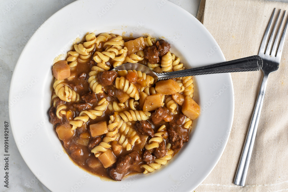 Obraz premium beef stew with rotini pasta