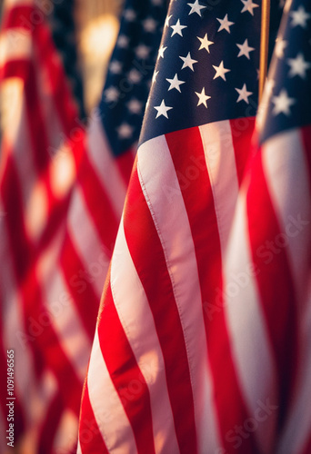 Close-up of American flags waving in the wind, showcasing patriotism and celebration.

 photo