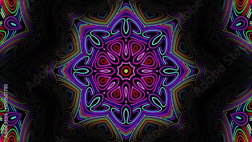 Abstract psychedelic mandala made of colorful trippy patterns with morphing lines on a dark background. Acid colored kaleidoscope for trance music festival or art performance. Motion design , 4K 30fps