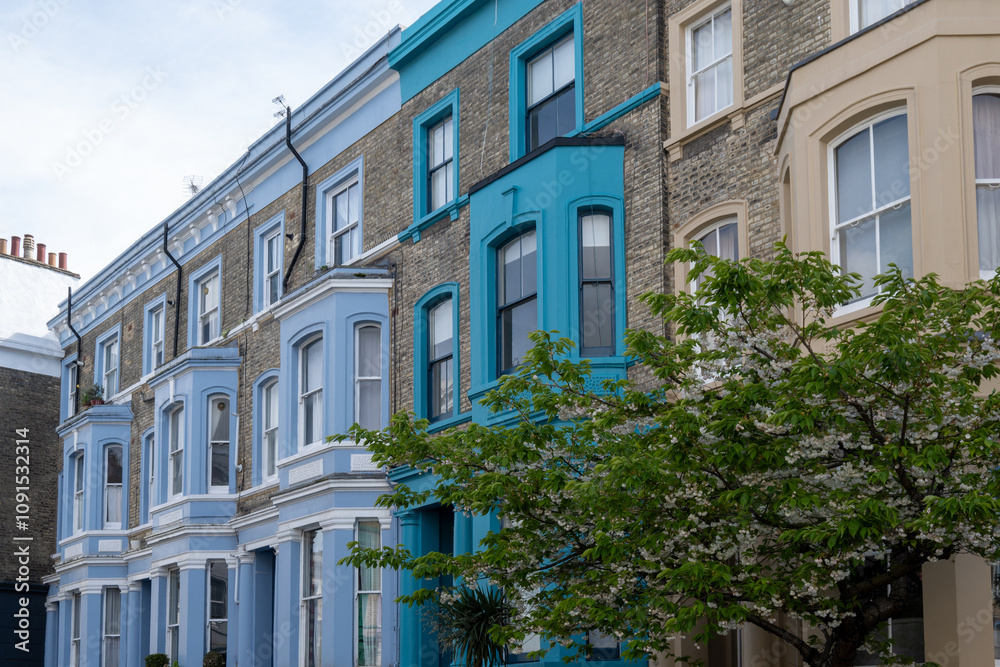 Naklejka premium Touristic route on Notting Hill, walking on streets with colourful houses, Portobello road, city life, wealthy neighbourhoods in London, UK