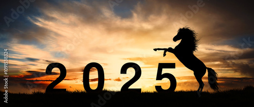 Silhouette of a magnificent stallion rearing up to greet the arrival of the new year 2025