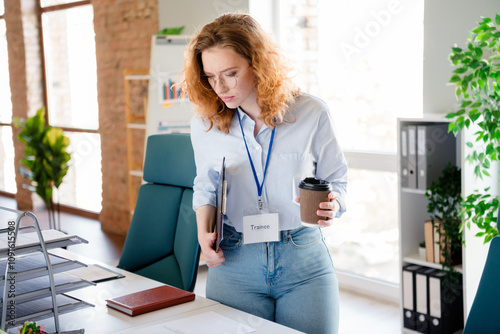 Photo of pretty young girl drink coffee trainee badge wear formalwear business adviser coworking successful nice light office photo