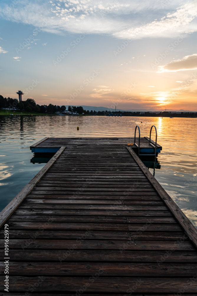 Obraz premium Lake schwarzl sunset panorama schwarzlsee near the styrian capitol Graz in Austria.