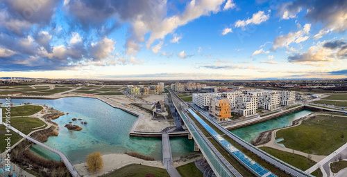 Vienna, Austria - December 27, 2022. Panorama of new modern hipster quarter Asperner See Seestadt in Winter