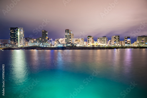 Vienna, Austria - December 27, 2022. New modern hipster quarter Asperner See Seestadt in Winter night