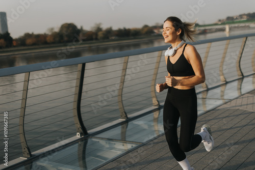 Joyful jogger enjoying a mo...