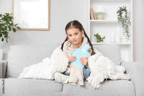 Sick little girl with hot w...
