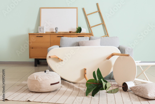 Messy living room with an o...
